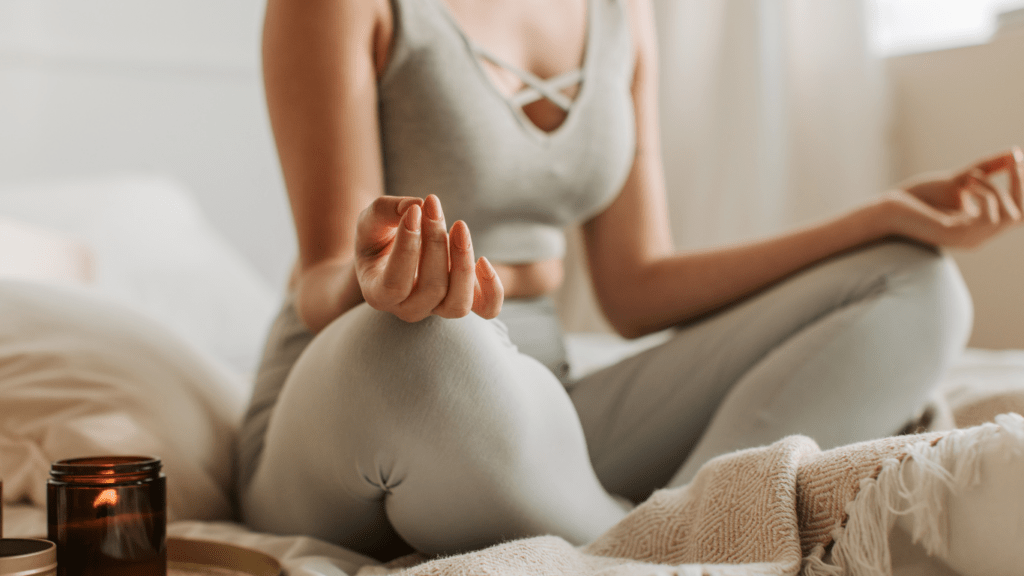 A person meditating in a yoga pose