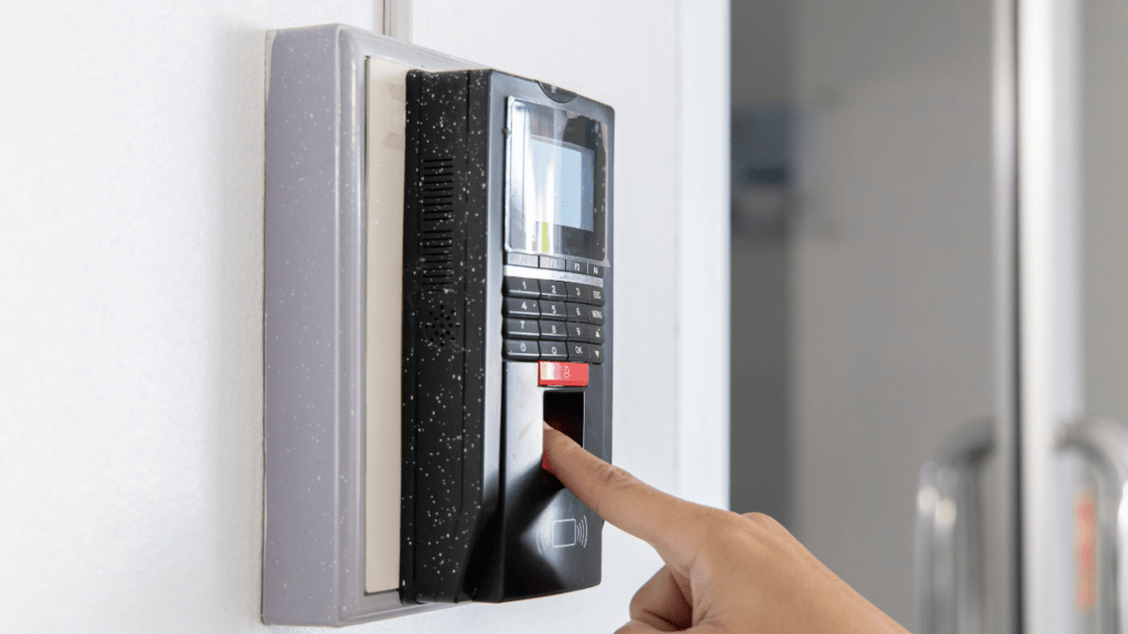 a person pressing a button on an access control system