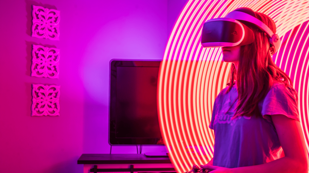 A person wearing a VR headset in a room with neon lights