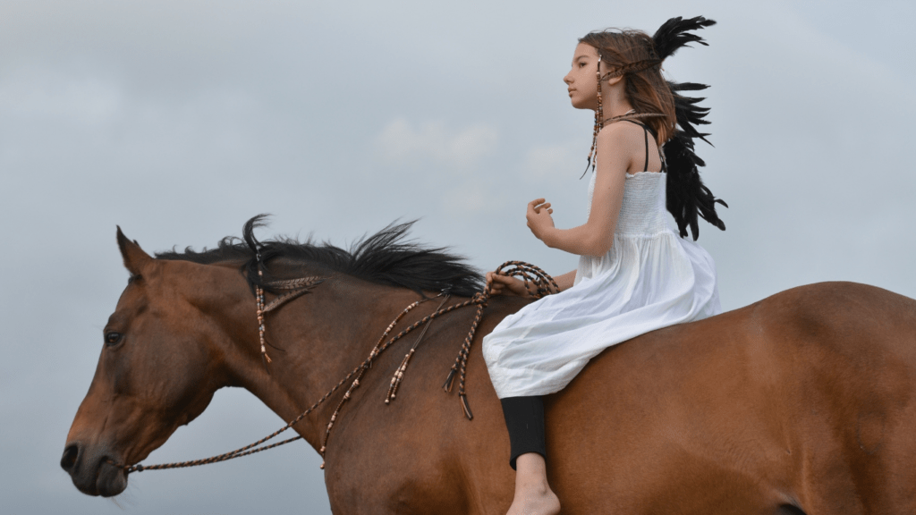 a women is riding a horse