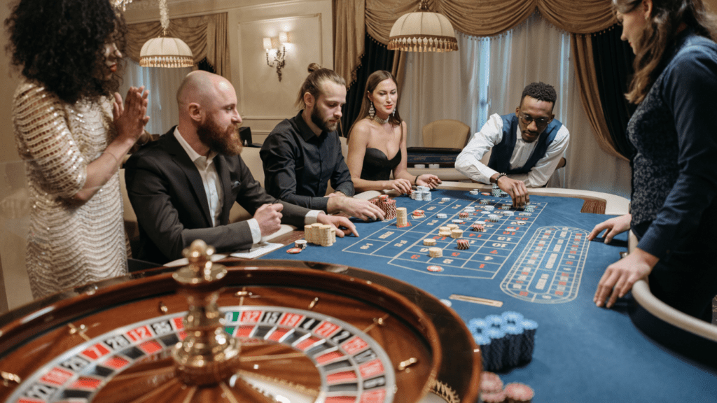 a group of people playing poker at a casino table