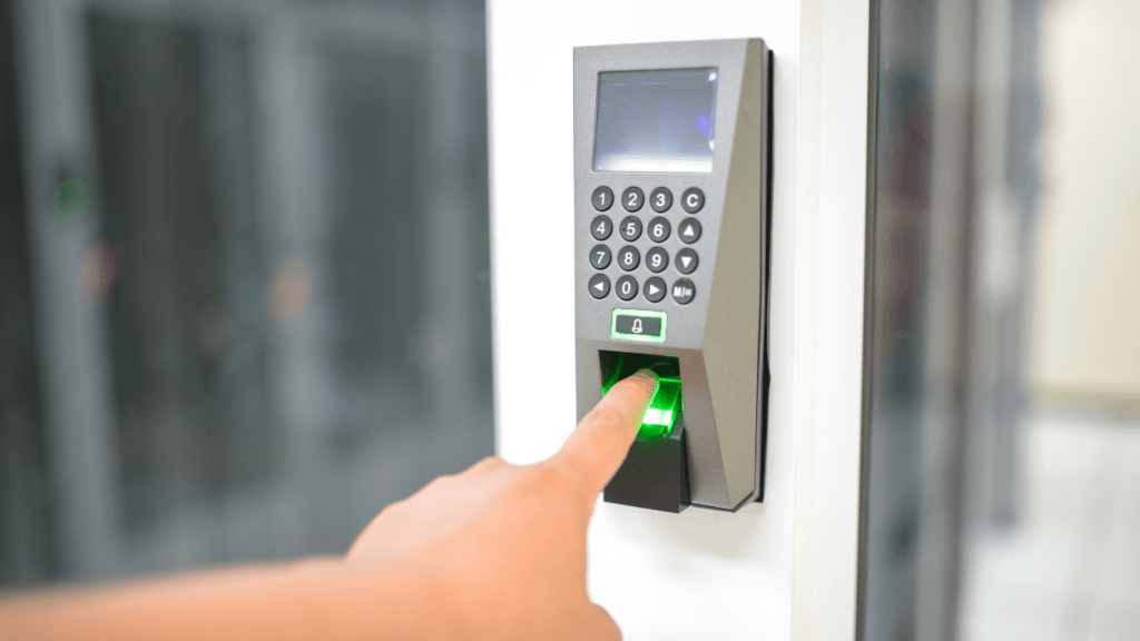 a person pressing a button on an access control system