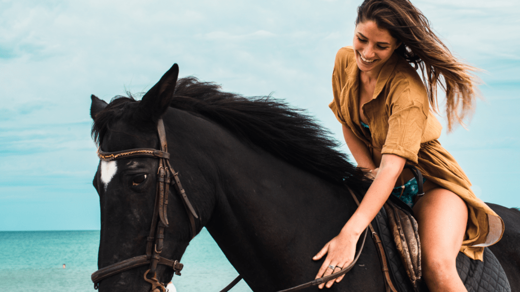 a women is riding a horse